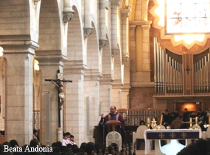 Priest clothed in traditional purple robe for Lent - Ash Wednesday Celebration in the Church of Nativity in Bethlehem, West Bank