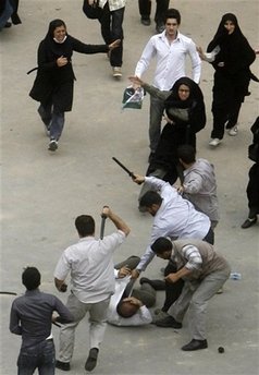 Iran security forces beating participants of a peaceful protest, Hundreds and pehaps thousands of Iranian arrested in Tehran and other major cities in Iran, Government Crack down on Iranian's protesting the election result - Millions of Iranians Protes Iran Presidential Election result - Islamic Republic of Iran Government cracks down on Iranian youth protesting the lack of Freedom and aleged Fraud election result