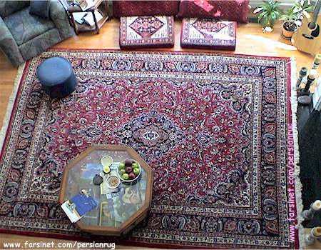 A traditional design Mashhad Persian Rug